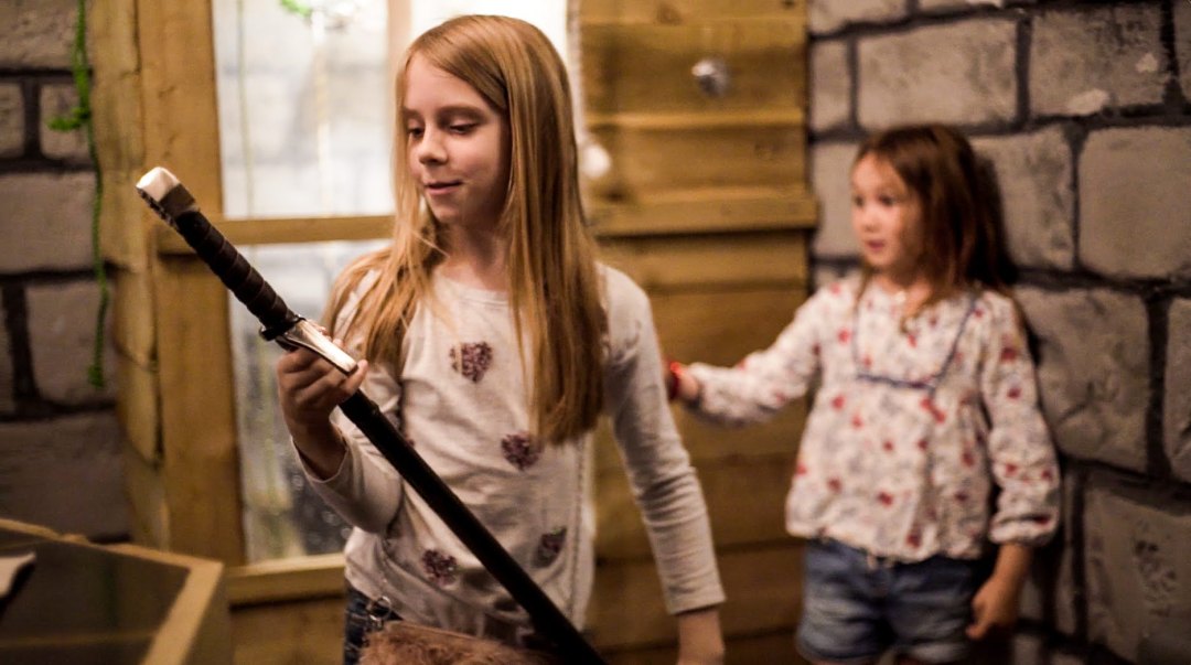 Parties Page – Smaller Image a little girl standing in front of a building