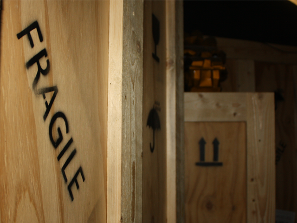 a clock on top of a wooden door