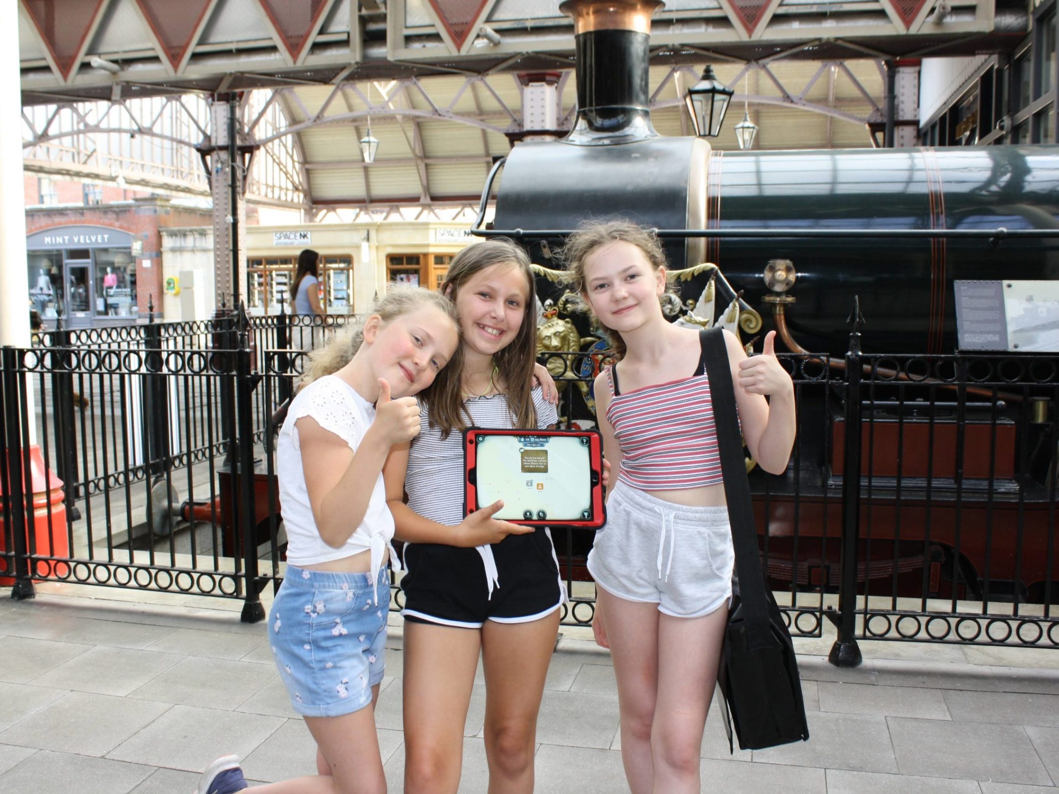 a woman standing in front of a building